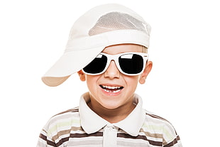 boy wearing white mesh cap ,white plastic framed sunglasses and white and gray polo shirt